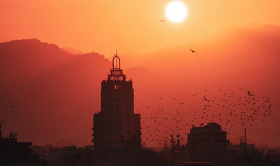 Old Apartment Buildings in Urban Downtown City with Mountains in Background. Palermo, Sicily, Italy. Dramatic Sunset Sky