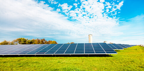 solar panels in a field. photovoltaics, alternative electricity source. concept of sustainable...