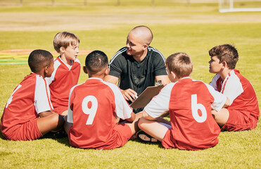 kids, soccer and team coach planning training with clipboard on soccer field for sport competitiion...