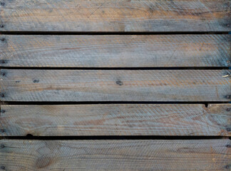 Charming old wooden fruit crate. Image taken from the parallel planks of the bottom, by age...