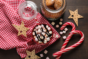 Concept of sweet drink, tasty cocoa drink with marshmallow, top view
