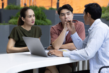 Meeting of asian man and woman in casual dress. Concept for working and open office.