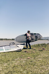 Windsurfer on a windy summertime day at the lake.