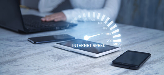 Speedometer on the tablet with a smartphone. Internet speed