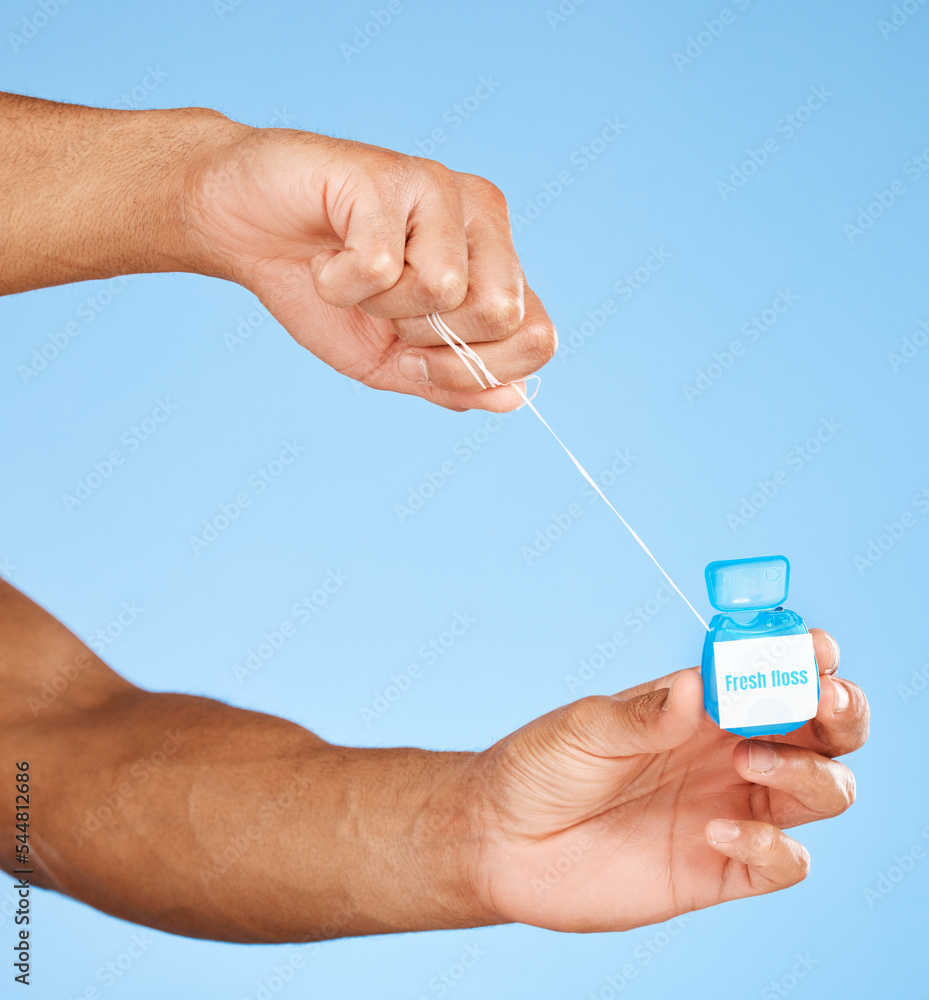 Poster Floss, dental healthcare and man hands with product container on studio mock up for teeth, mouth and dentist cleaning marketing. Medical, wellness and dental floss health care with blue mockup