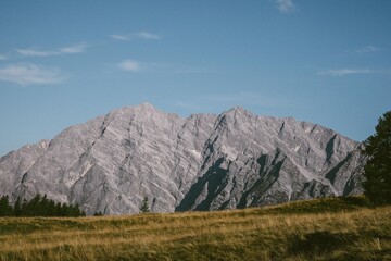 a landscape in the mountains with some clouds