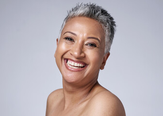 Smile, happy and portrait of a senior woman with hair, skin and wellness against a grey mockup...