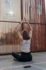 Healthy woman yoga lifestyle balanced practicing meditate and zen energy exercise sport yoga outdoors