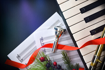 Christmas music concert concept with piano and wind instruments