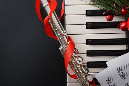 Christmas concert with piano and transverse flute close up