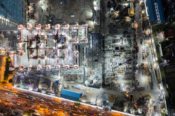 aerial view of construction site with tower crane urban construction Rush hour of concrete pouring
