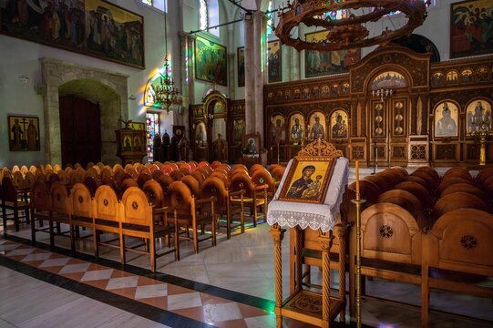 Nice wooden armchair in main nave with altare in church of Agios Titos, Heraklion.