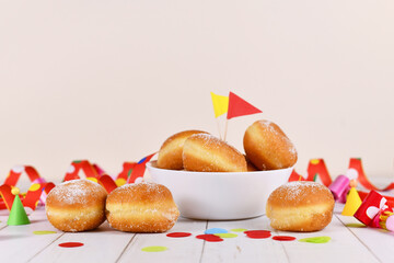 German traditional 'Berliner Pfannkuchen', a donut without hole filled with jam. Traditional served...