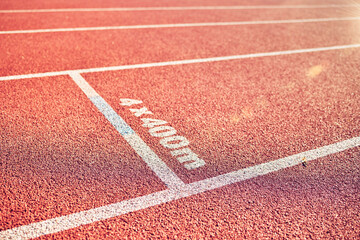 Ground, field and race track road in stadium for fitness, running track and sports with nobody. Pattern, texture and background of empty racecourse with no people for exercise, workout and training