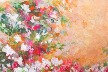 オレンジの壁に白とピンクの花と緑の葉の絵画