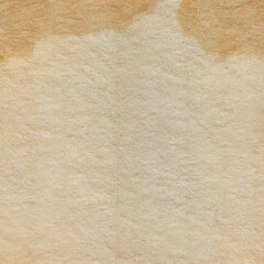 Old wrinkled stained yellowed paper grunge texture background