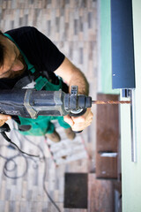 construction worker installing terrace roof on house