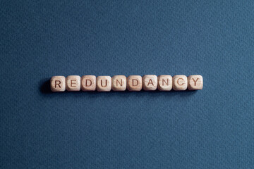 Redundancy - word concept on cubes