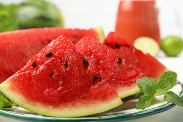 Slices of juicy watermelon on plate, closeup