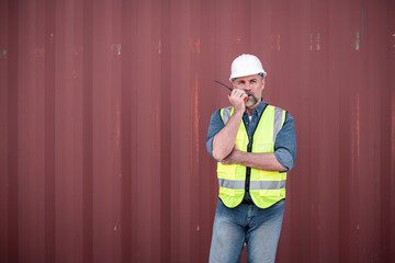Portrait Engineer worker under working inspection and checking with radio communication ,file...