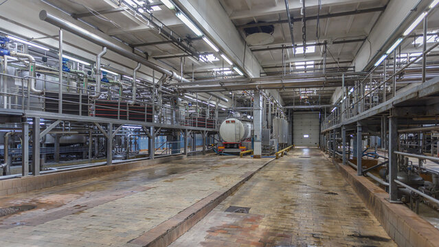 Tanker With Raw Milk In A Storage Room.