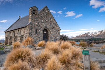 The Church Of Good Shepherd in late winter with beautiful snow capped Southern Alps mountain range...
