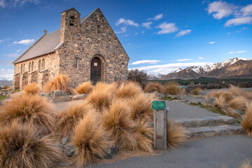 The Church Of Good Shepherd in late winter with beautiful snow capped Southern Alps mountain range...