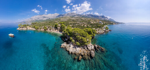 Fototapeta premium natural rocky beach in Croatia, Mediterranean holiday destination in Pula, Croatia, vacation on the Adriatic Sea, Croatian coast. High quality 4k footage