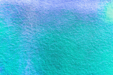 Colorful aerosol street wall background. Urban modern art texture. Wallpaper design backdrop...