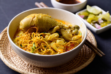 Northern Thai food (Khao Soi), Spicy curry noodles soup with chicken, Local Thai food