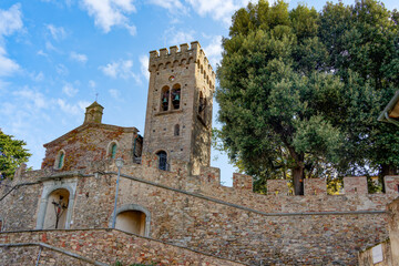 Fototapeta na wymiar Panorama of the city walls and the castle of Castagneto Carducci Tuscany Italy