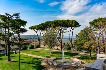 Obraz premium Panorama from the main square of the village towards the plain and the sea from Castagneto Carducci Tuscany Italy