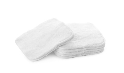 Pile of cotton pads on white background