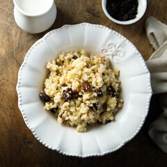 Healthy millet porridge with raisins
