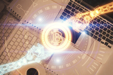 Blockchain theme hologram drawings over computer on the desktop background. Top view. Double...
