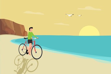 Obraz premium Young man cycling in the beach