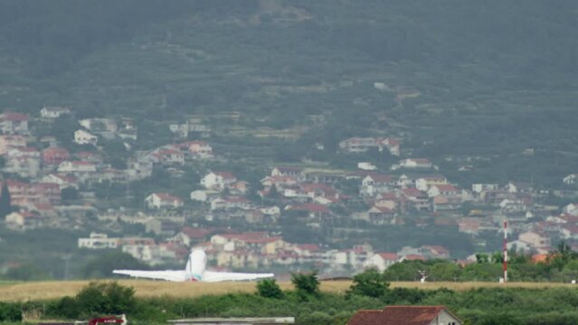 A passenger plane takes off at the airport. High quality 4k footage