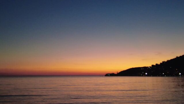 Sunset on the sea, coastline and sea