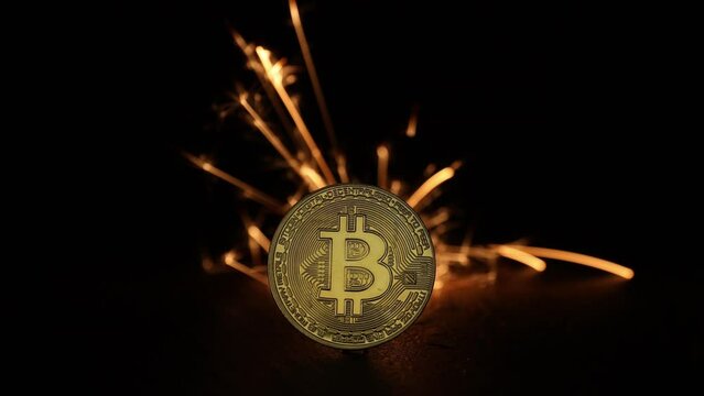 Digital bitcoins with fire sparks in the back
