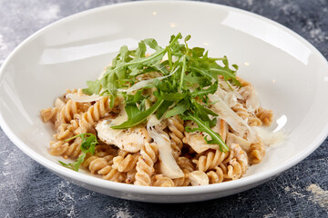 pasta with cheese and arugula