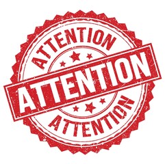 ATTENTION text on red round stamp sign