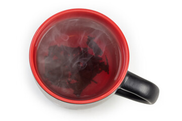 Black with red cup of freshly brewed tea, top view