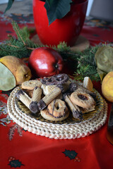 Lovely close up image of Christmas cookies decorated on a plate on a table.