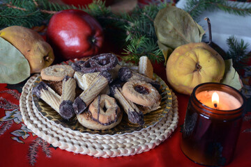 Lovely close up image of Christmas cookies decorated on a plate on a table.