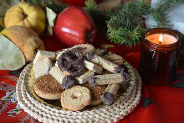Lovely close up image of Christmas cookies decorated on a plate on a table.