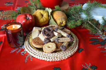 Lovely close up image of Christmas cookies decorated on a plate on a table.