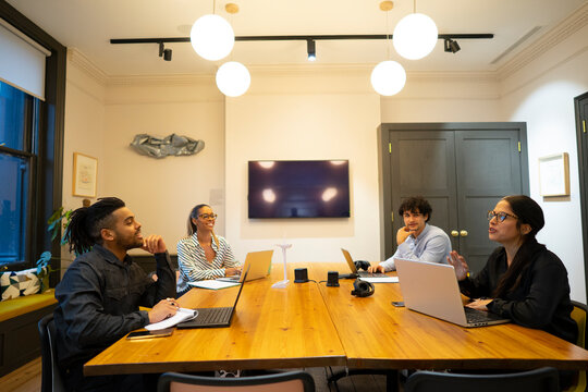 Business people having meeting in board room