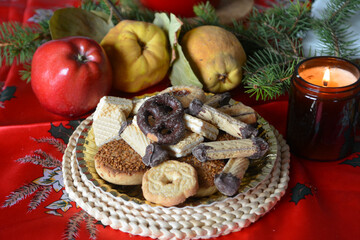 Lovely close up image of Christmas cookies decorated on a plate on a table.