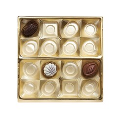 Partially empty box of chocolate candies isolated on white, top view