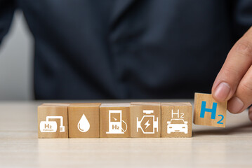 Hydrogen fuel is used to replace carbon dioxide, helping to reduce global warming. wood cube icon...